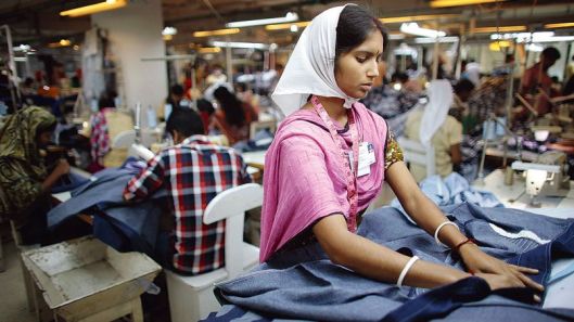 Employees work in a factory of Babylon Garments in Dhaka
